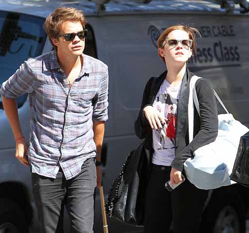 Johnny Simmons and Emma Watson got caught together on camera.